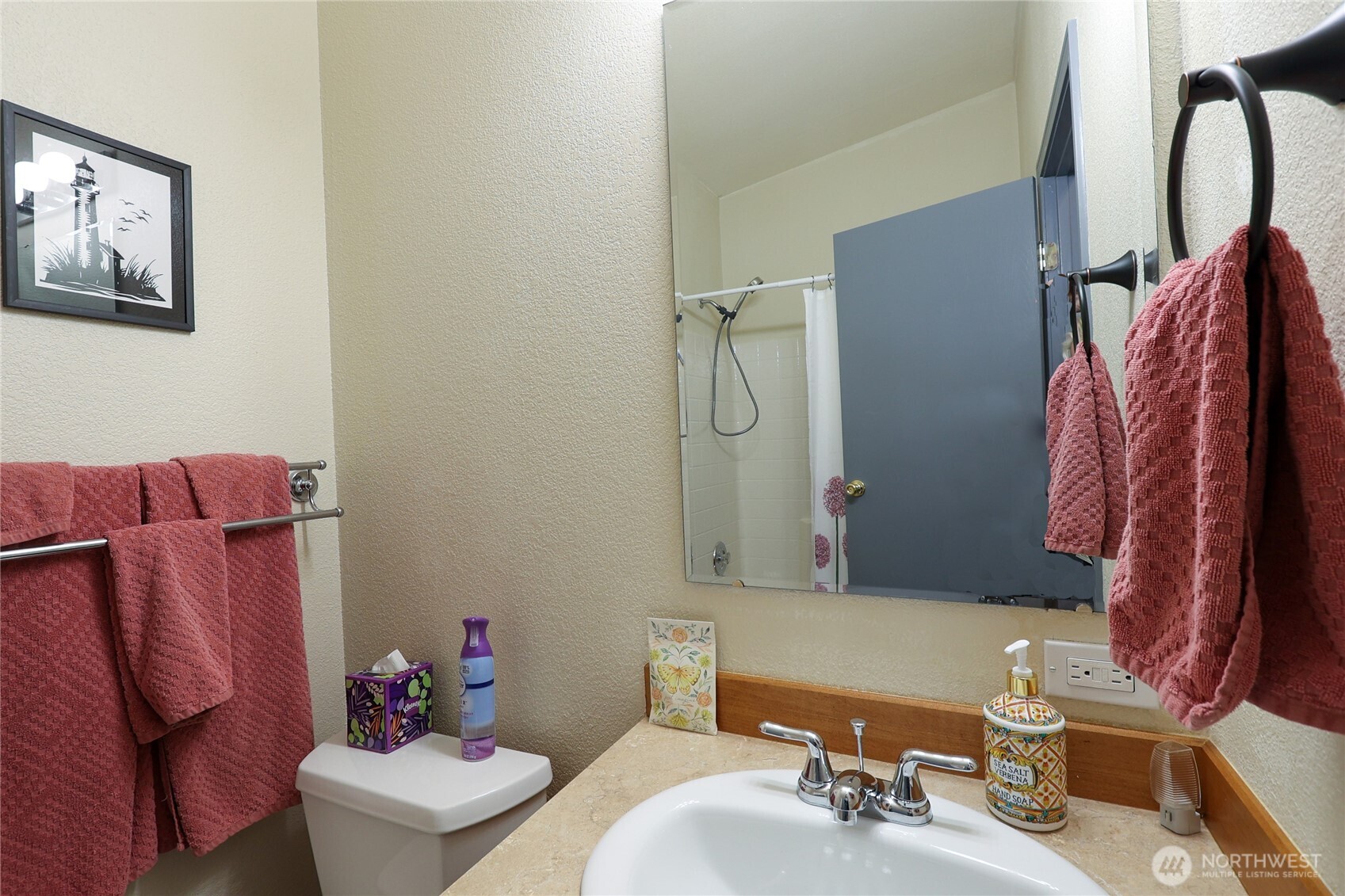 1427 100th Street Southwest, Unit 57 Everett, WA 98204 - Photo 14 of 38 a bathroom with a sink toilet and shower