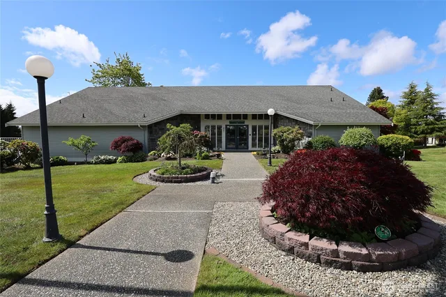 a view of a house with a garden