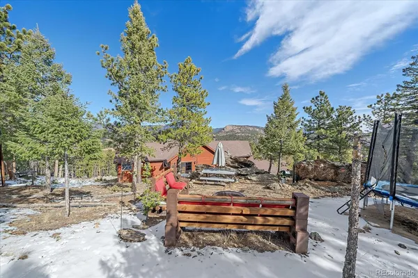 a bench sitting in the middle of a park