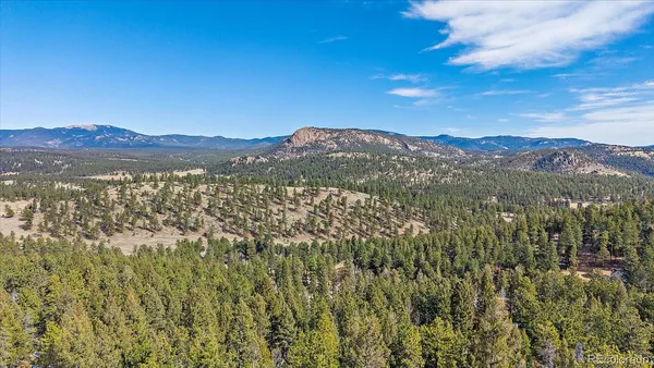 a view of lake with mountain