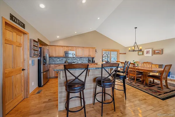 a view of a livingroom with furniture and window