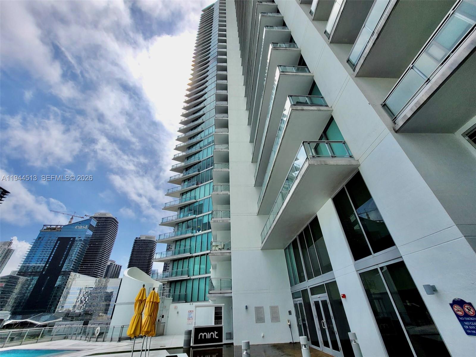 92 Southwest 3rd Street, Unit 1808 Miami, FL 33130 - Photo 24 of 45 a view of staircase and utility room