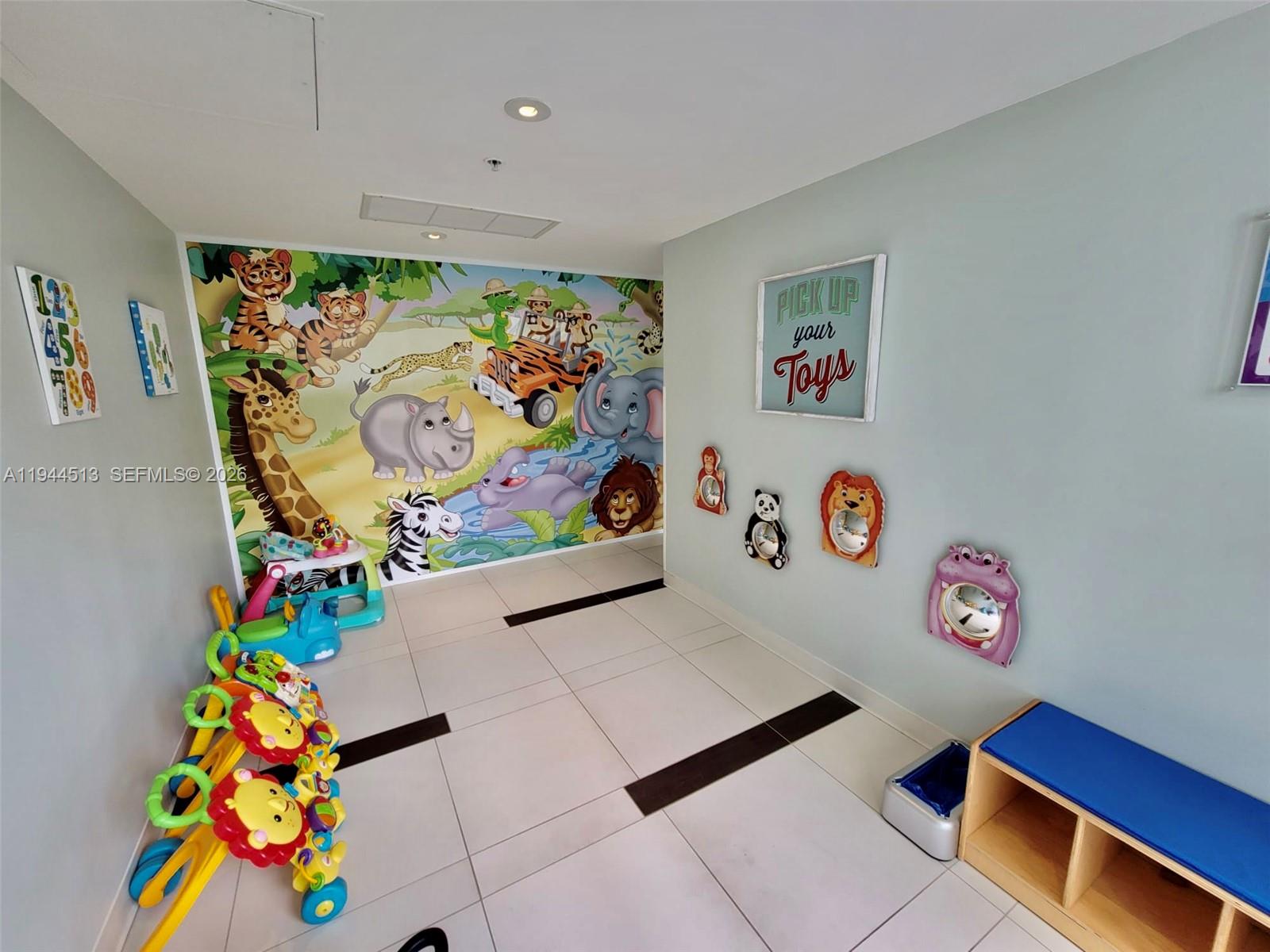 92 Southwest 3rd Street, Unit 1808 Miami, FL 33130 - Photo 34 of 45 a room with toys and wall paintings