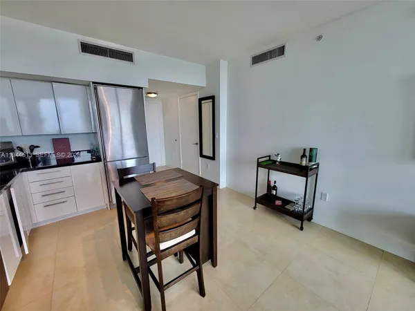 a room with furniture and a piano table