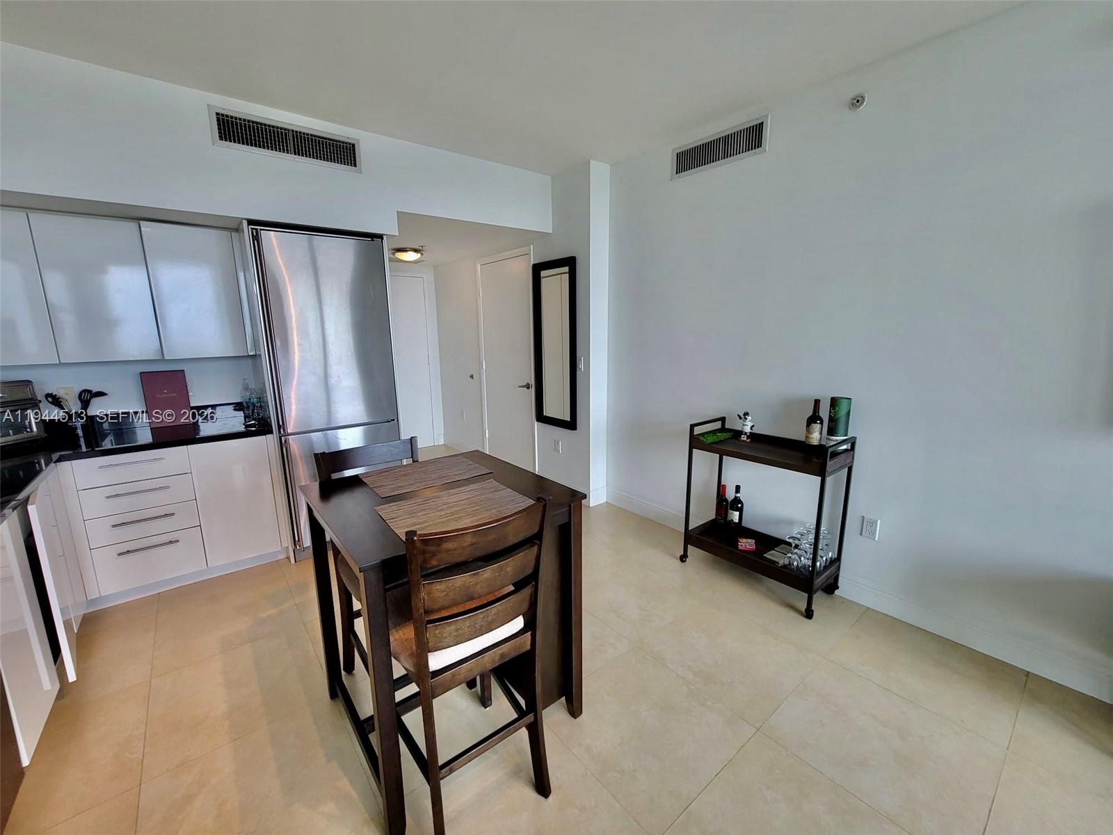 92 Southwest 3rd Street, Unit 1808 Miami, FL 33130 - Photo 8 of 45 a room with furniture and a piano table