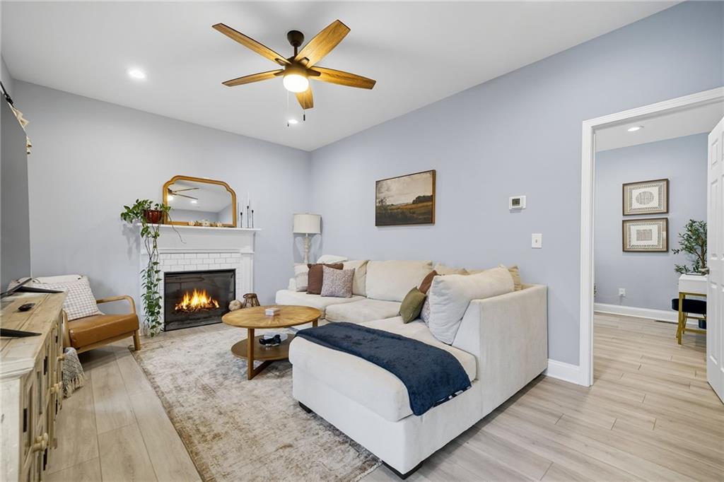 204 North Avenue Fairmount, GA 30139 - Photo 17 of 35 a living room with furniture and a fireplace