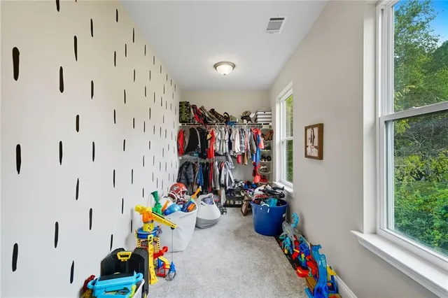 a view of kids room with toys