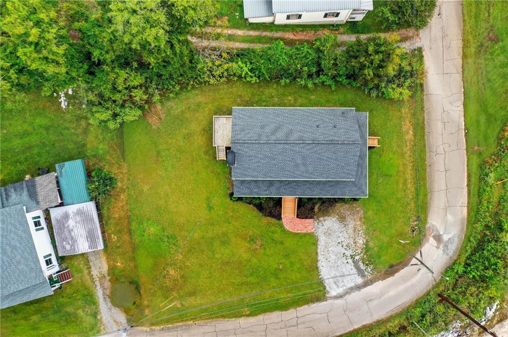 204 North Avenue Fairmount, GA 30139 - Photo 5 of 35 an aerial view of a house with a yard basket ball court and outdoor seating