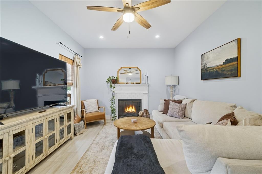 204 North Avenue Fairmount, GA 30139 - Photo 7 of 35 a living room with furniture and a fireplace