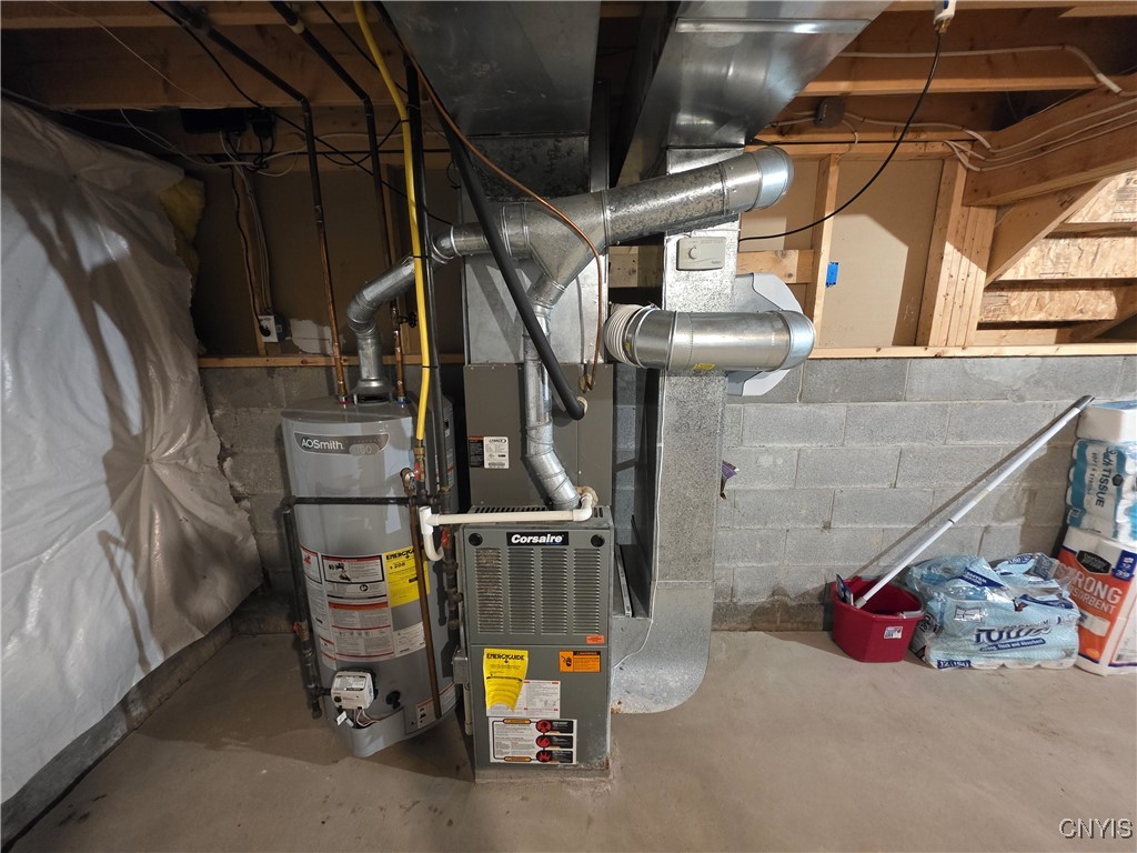 8775 Honeycomb Path Cicero, NY 13039 - Photo 29 of 44 Furnace with central air and hot water heater