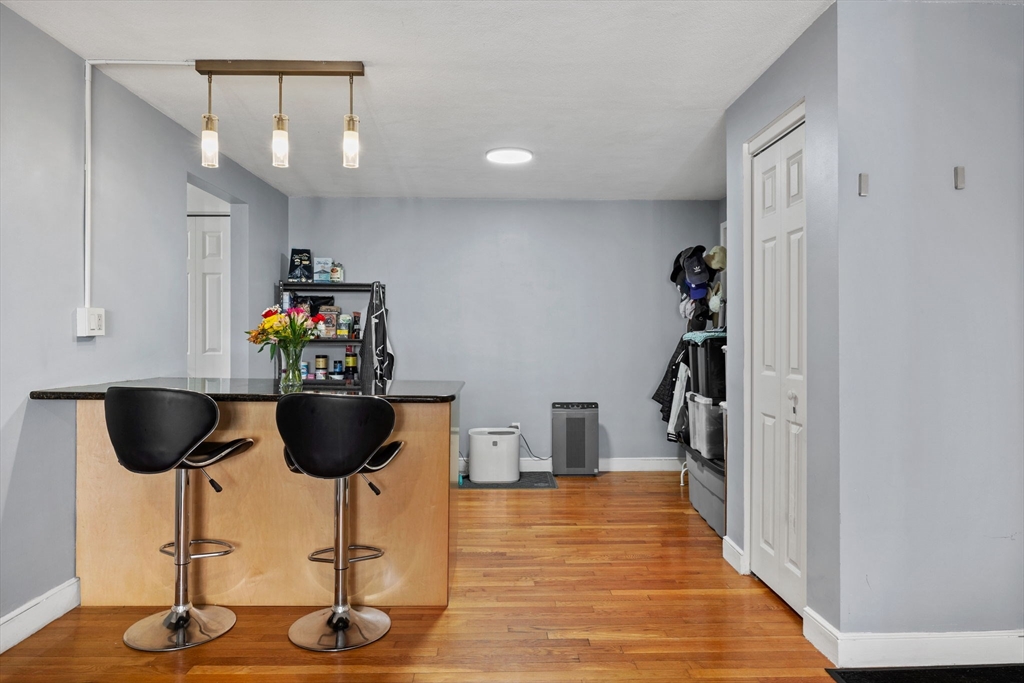 112 Decatur Street, Unit 6 Arlington, MA 02474 - Photo 6 of 16 a view of a kitchen and dining room