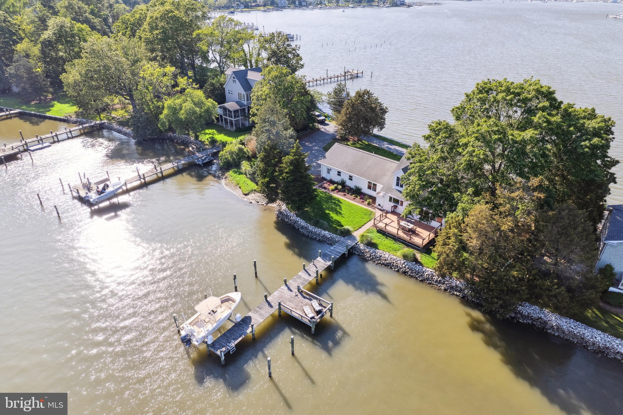 1045 Back Bay Beach Road West River, MD 20778 - Photo 1 of 33 an aerial view of a house with a yard and lake view