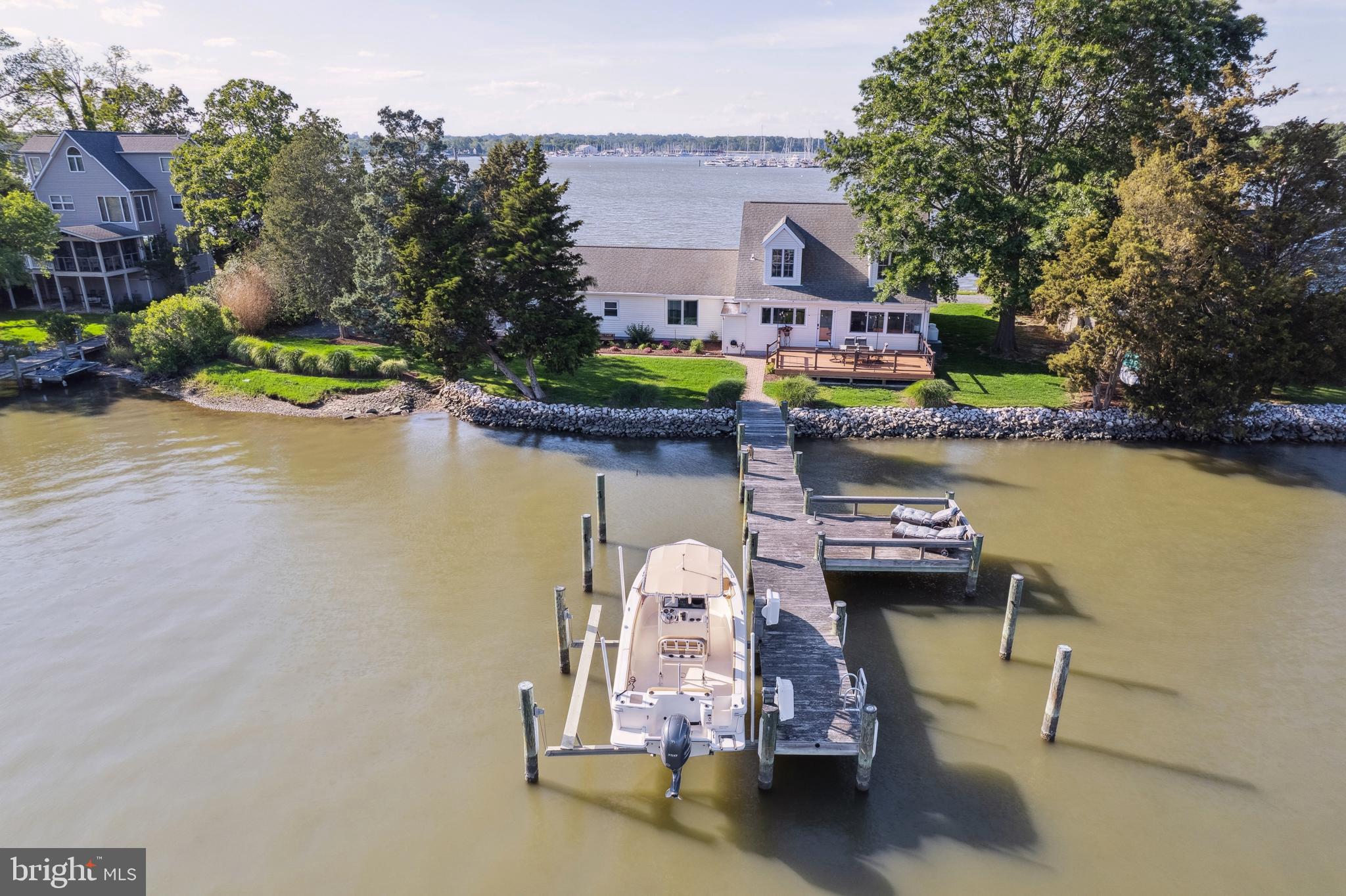 1045 Back Bay Beach Road West River, MD 20778 - Photo 13 of 33 an aerial view of a house with outdoor space lake view and lake view