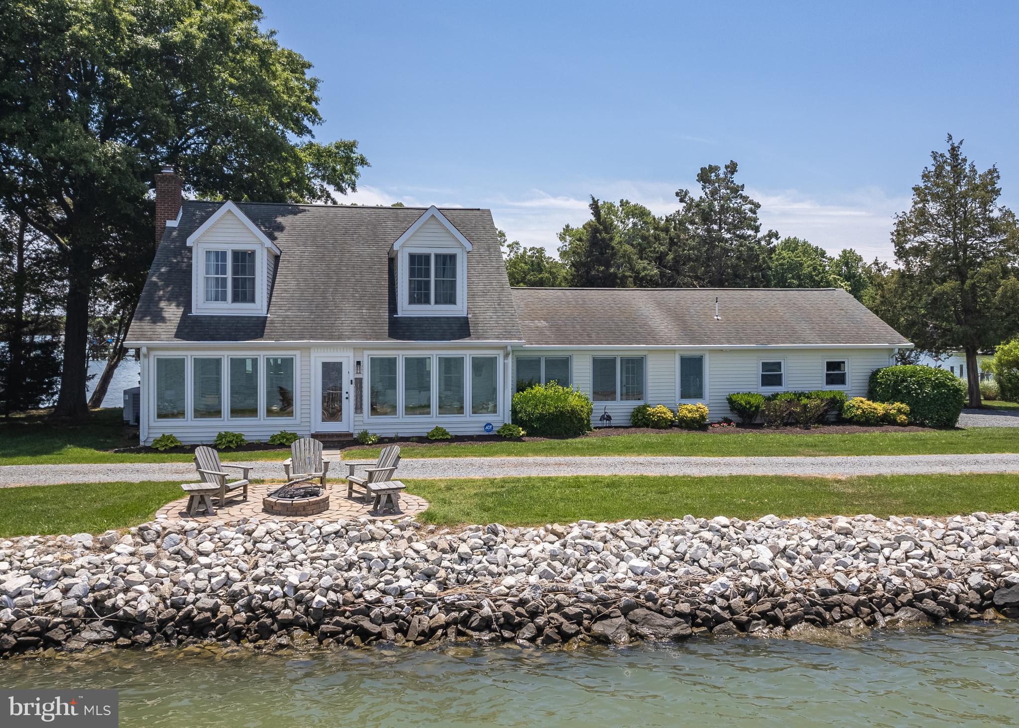 1045 Back Bay Beach Road West River, MD 20778 - Photo 15 of 33 a front view of a house with a yard