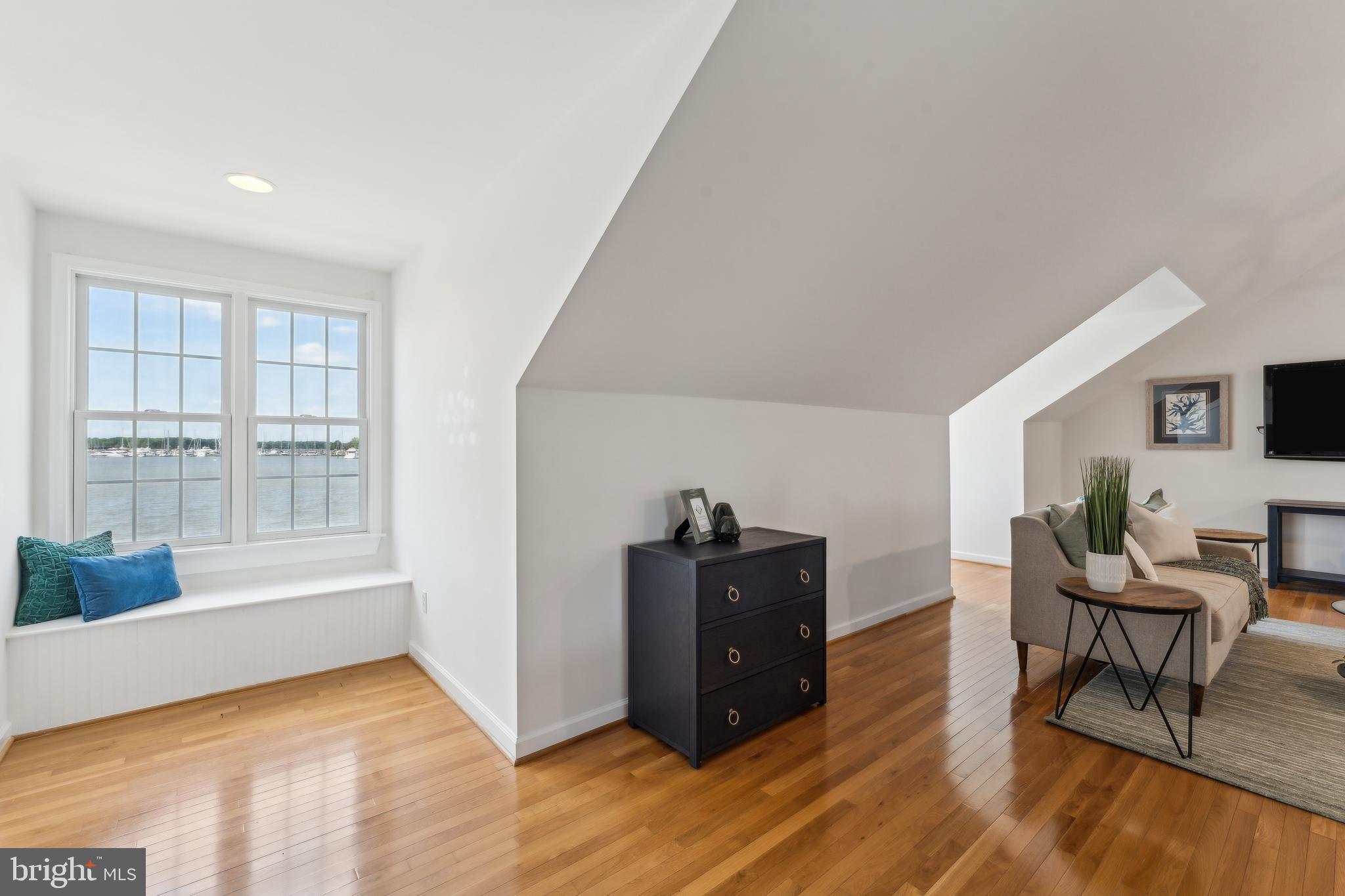 1045 Back Bay Beach Road West River, MD 20778 - Photo 27 of 33 a living room with furniture and wooden floor