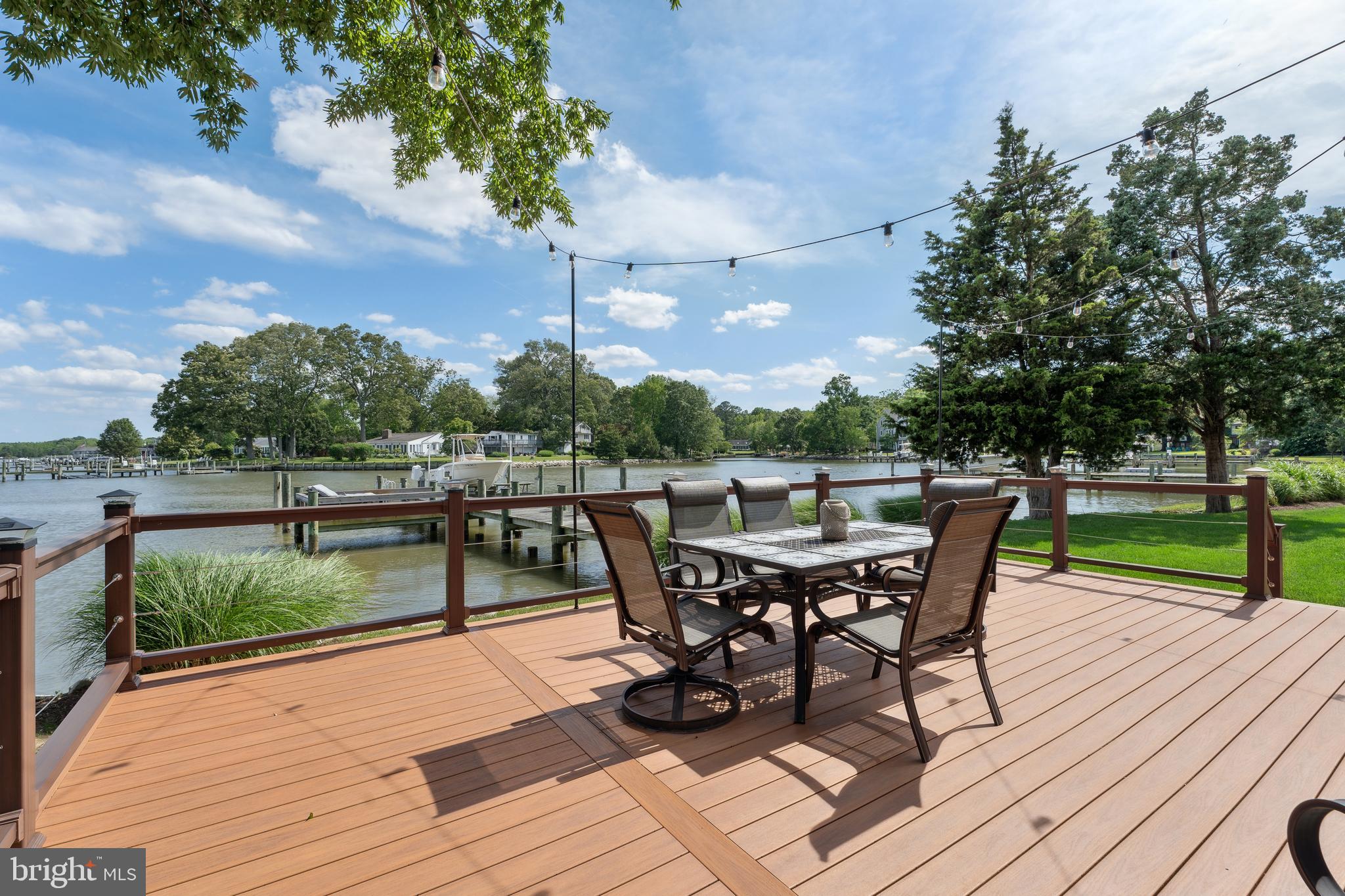 1045 Back Bay Beach Road West River, MD 20778 - Photo 4 of 33 a view of a terrace with furniture