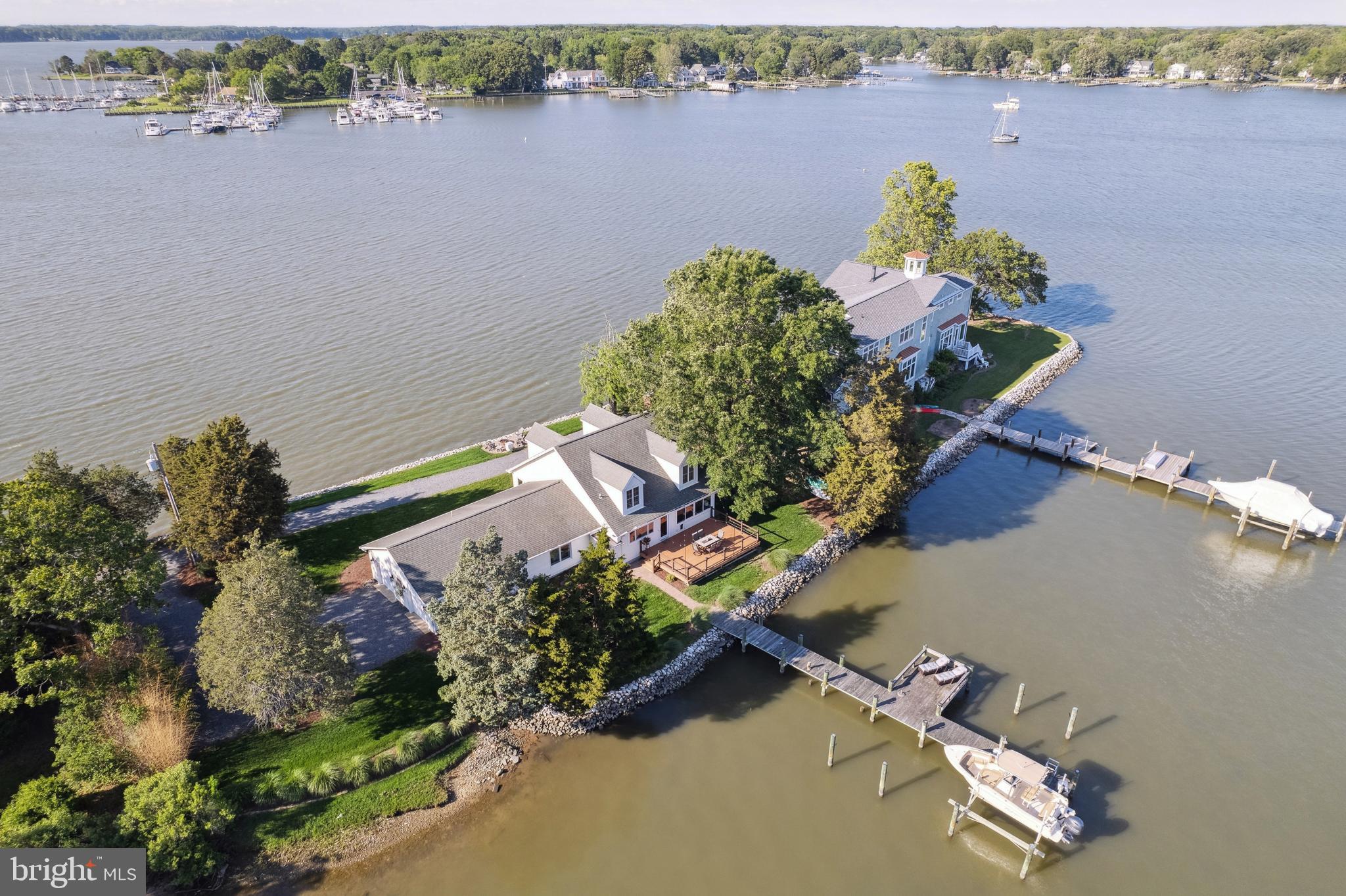 1045 Back Bay Beach Road West River, MD 20778 - Photo 10 of 33 an aerial view of a house with a lake view
