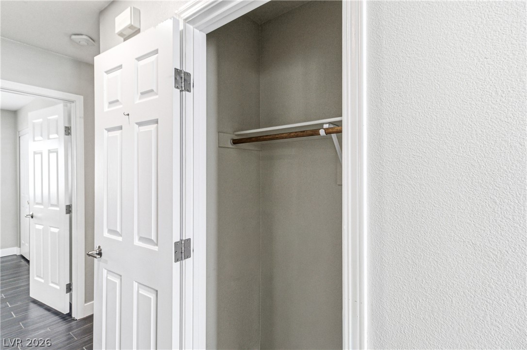 9523 Observer Street Las Vegas, NV 89123 - Photo 17 of 42 Functional storage awaits in this well-appointed closet, ready for your wardrobe.