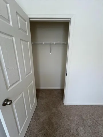 a view of a walk in closet