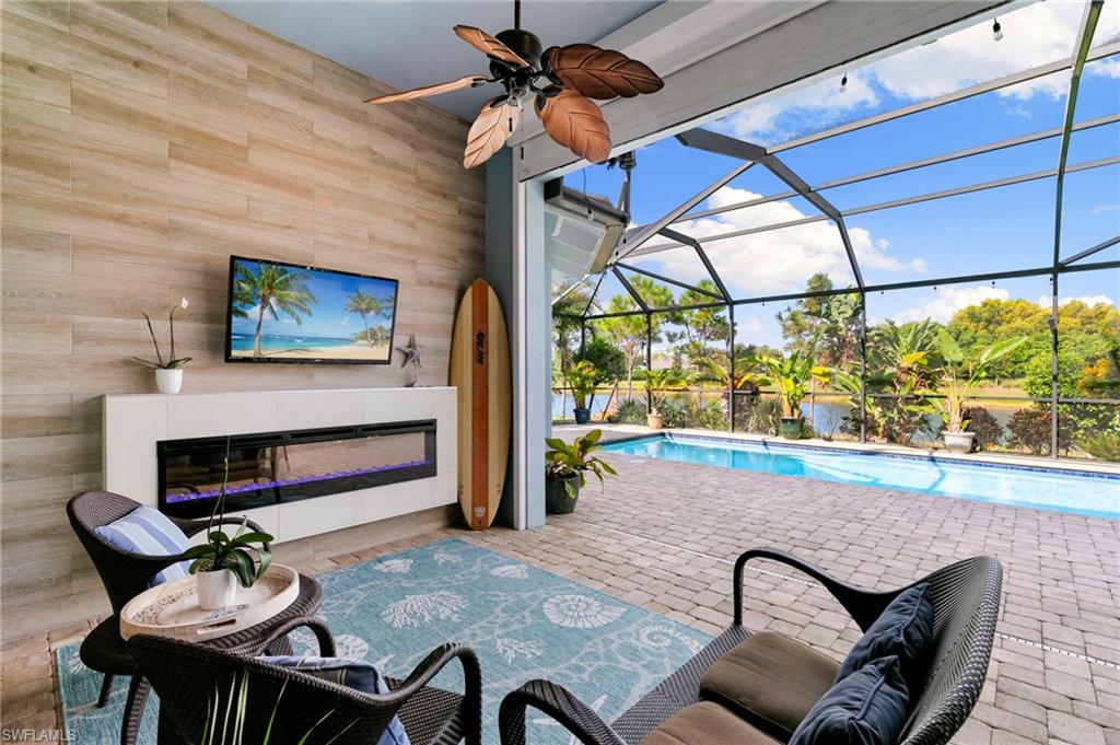 4922 Andros Drive Naples, FL 34113 - Photo 14 of 44 a living room with furniture