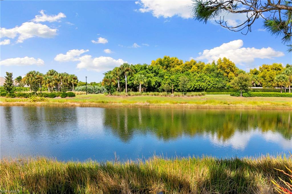 4922 Andros Drive Naples, FL 34113 - Photo 37 of 44 a view of lake with green space