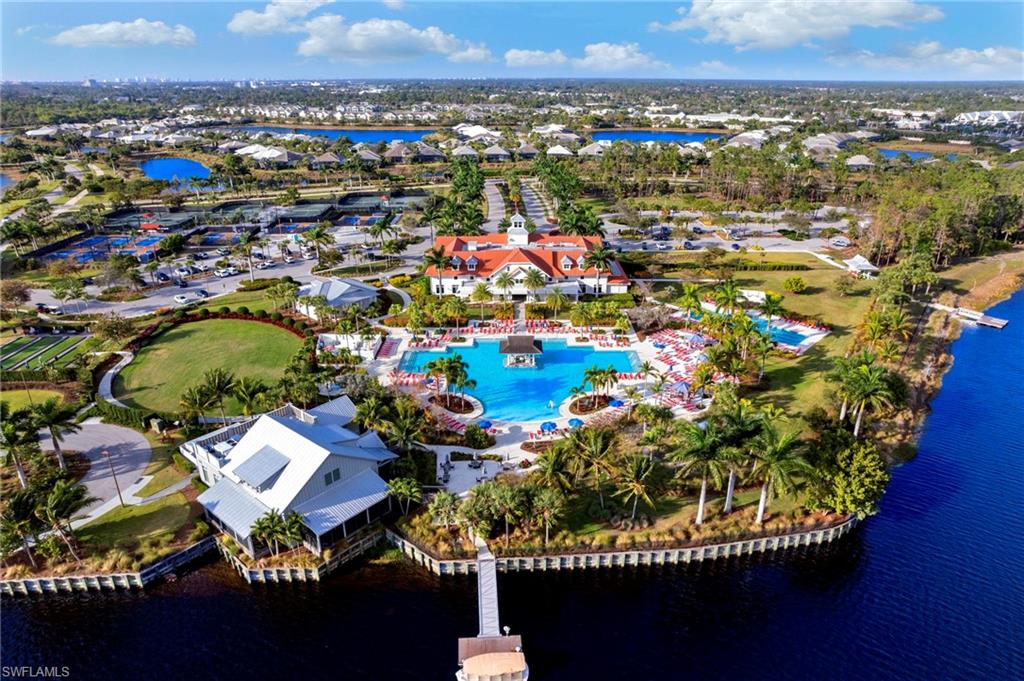 4922 Andros Drive Naples, FL 34113 - Photo 40 of 44 an aerial view of a residential houses with outdoor space and swimming pool