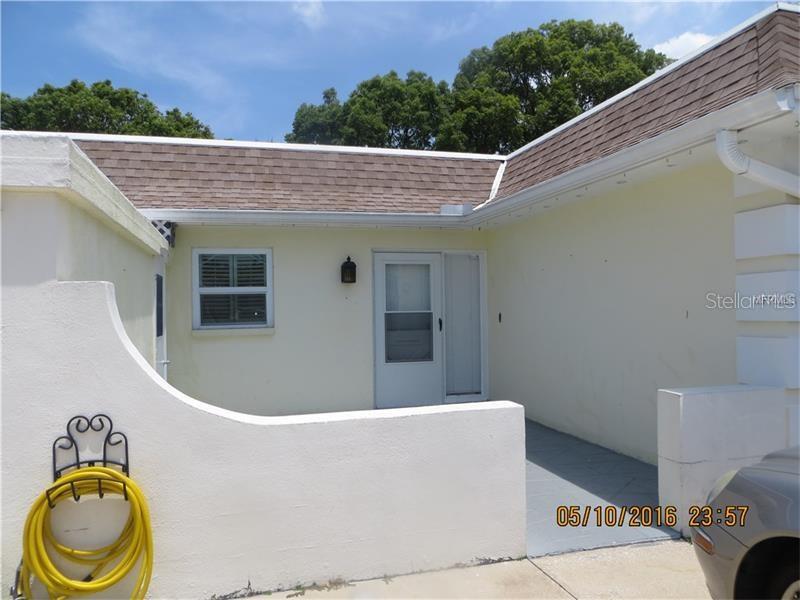 610 Indian Rocks Road North, Unit 101 Belleair Bluffs, FL 33770 - Photo 1 of 1 a view of outdoor space and deck