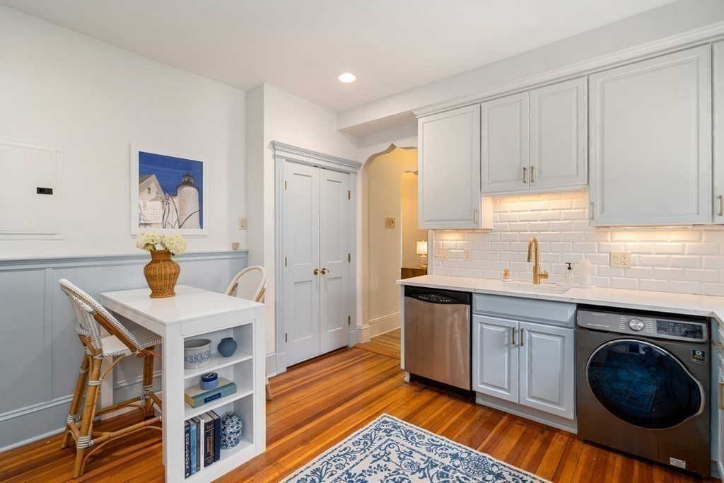 89 Mason Terrace, Unit 3 Brookline, MA 02446 - Photo 16 of 19 a kitchen with a sink cabinets and window