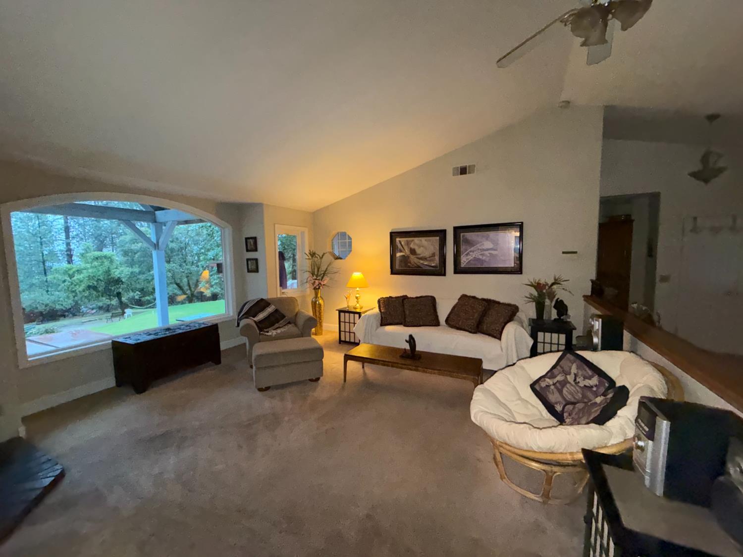 645 Rigby Lane Applegate, CA 95703 - Photo 25 of 52 a living room with furniture and a large window
