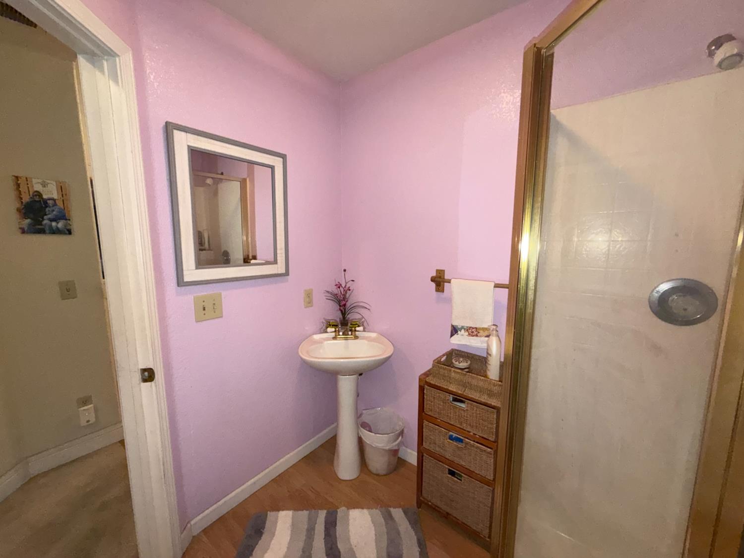 645 Rigby Lane Applegate, CA 95703 - Photo 39 of 52 a bathroom with a sink a toilet and mirror