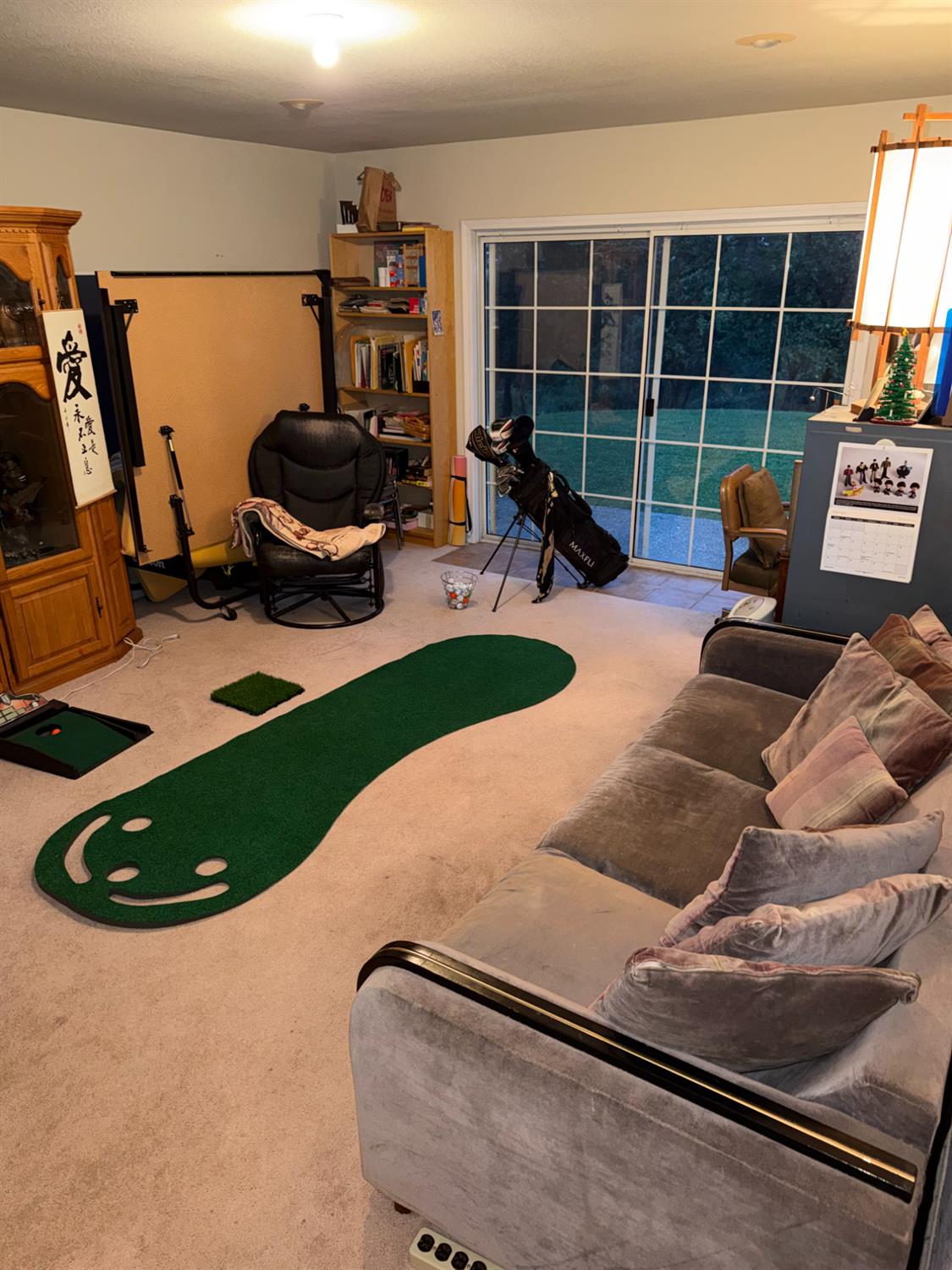 645 Rigby Lane Applegate, CA 95703 - Photo 41 of 52 a living room with furniture a window and gym equipment