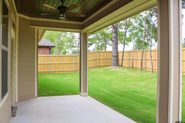 a view of a backyard with a garden