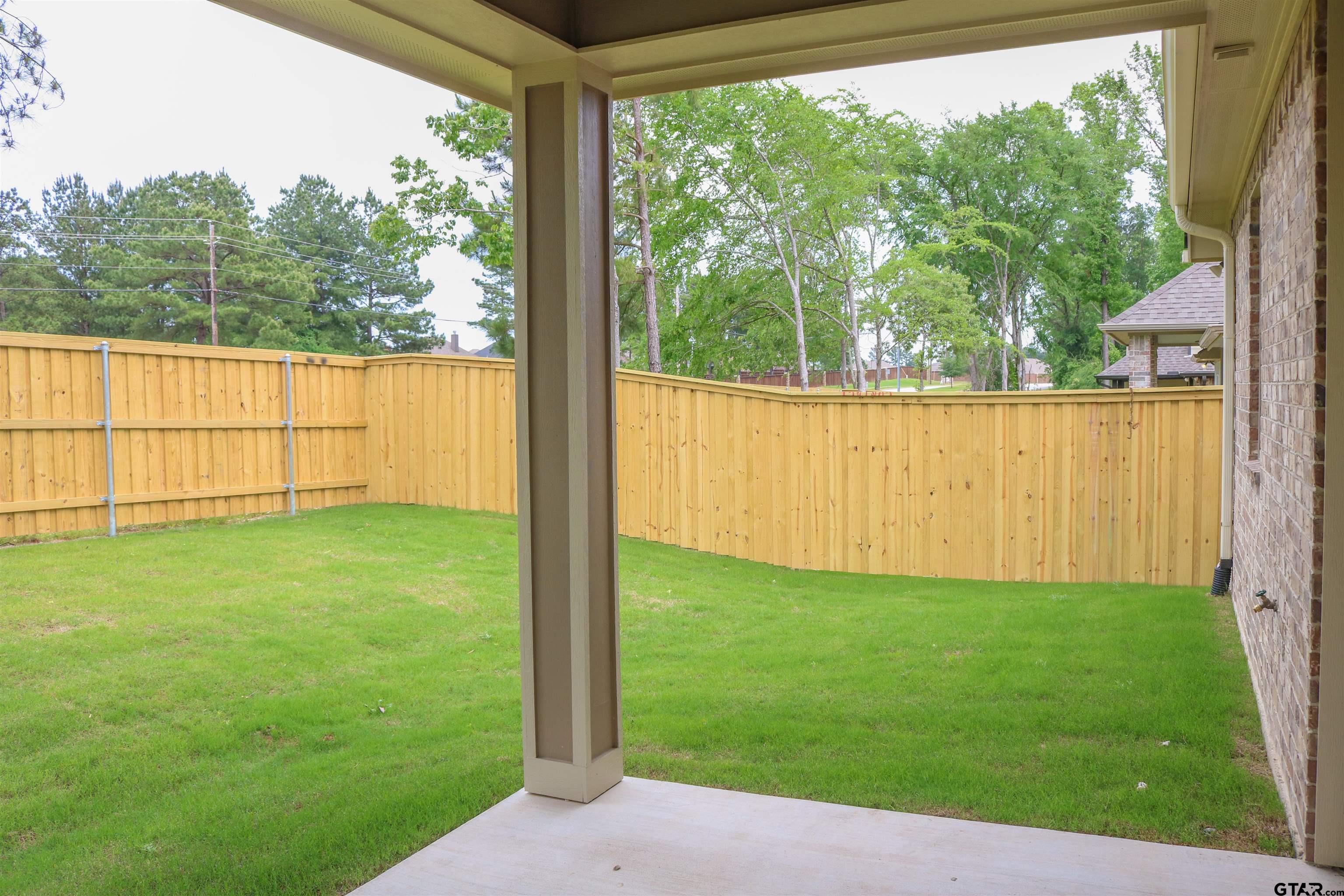 3915 Old Omen Road Tyler, TX 75707 - Photo 19 of 19 a view of a garden with a large trees