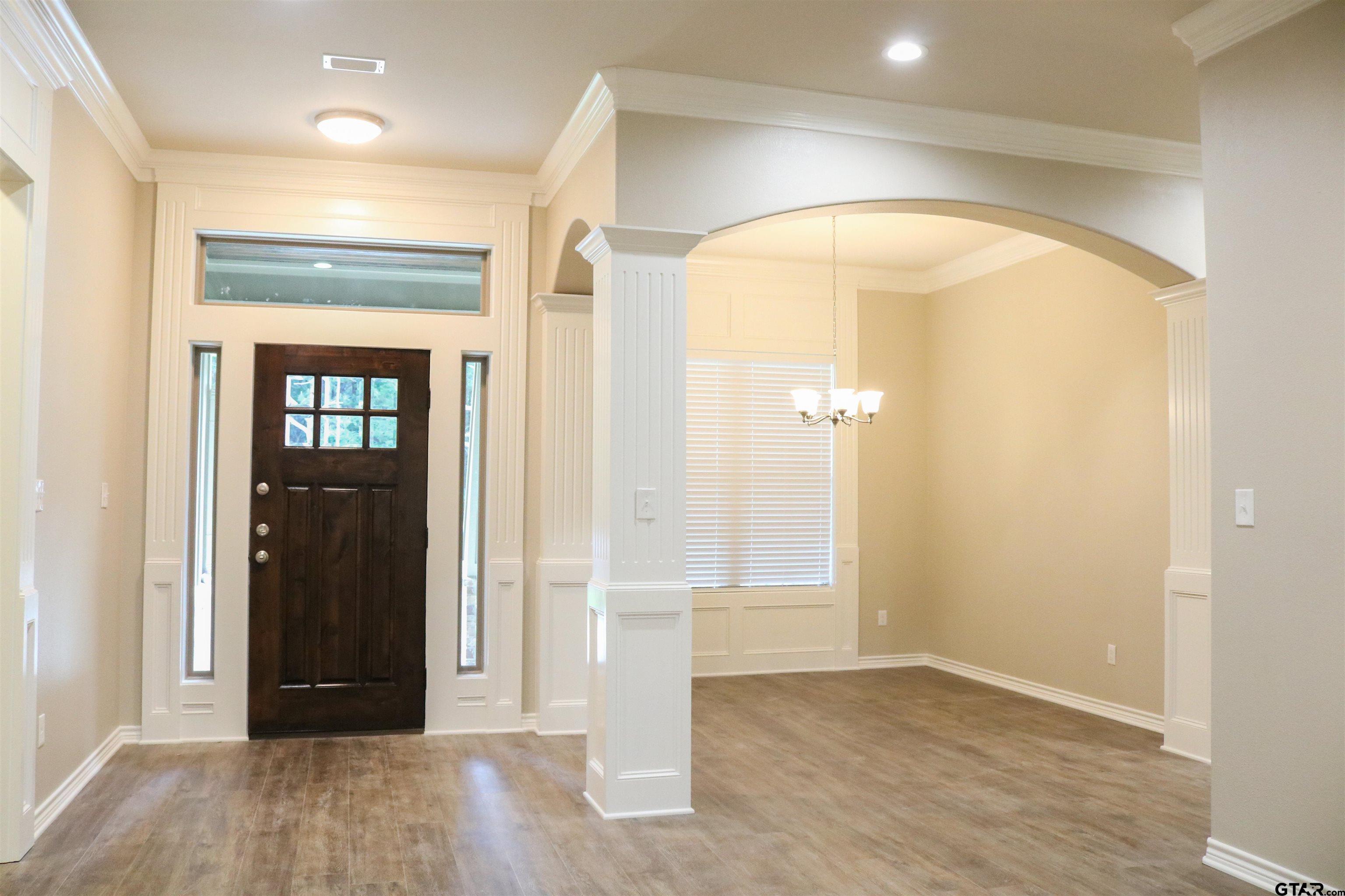 3915 Old Omen Road Tyler, TX 75707 - Photo 2 of 19 wooden floor in an empty room