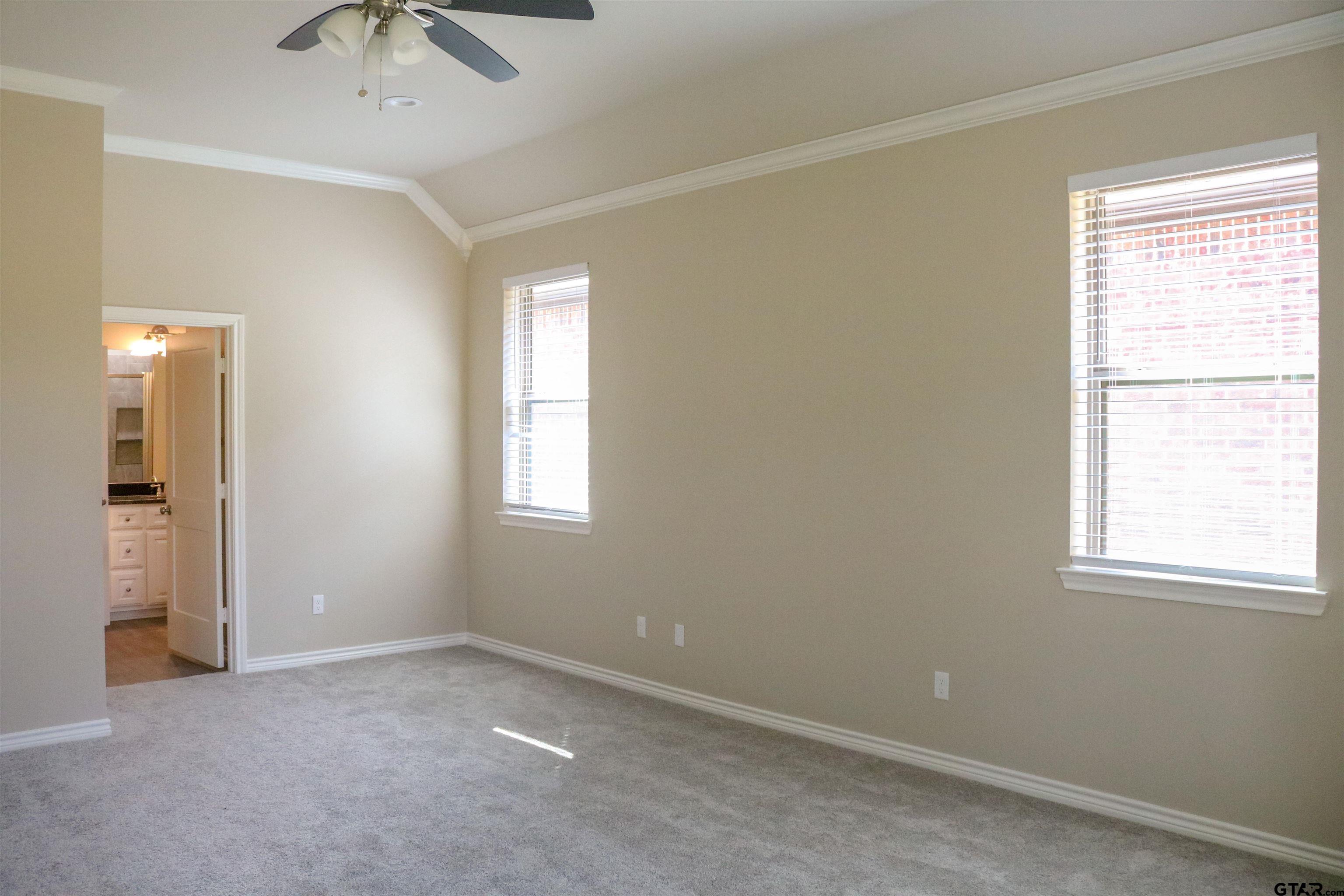 3915 Old Omen Road Tyler, TX 75707 - Photo 7 of 19 an empty room with a window