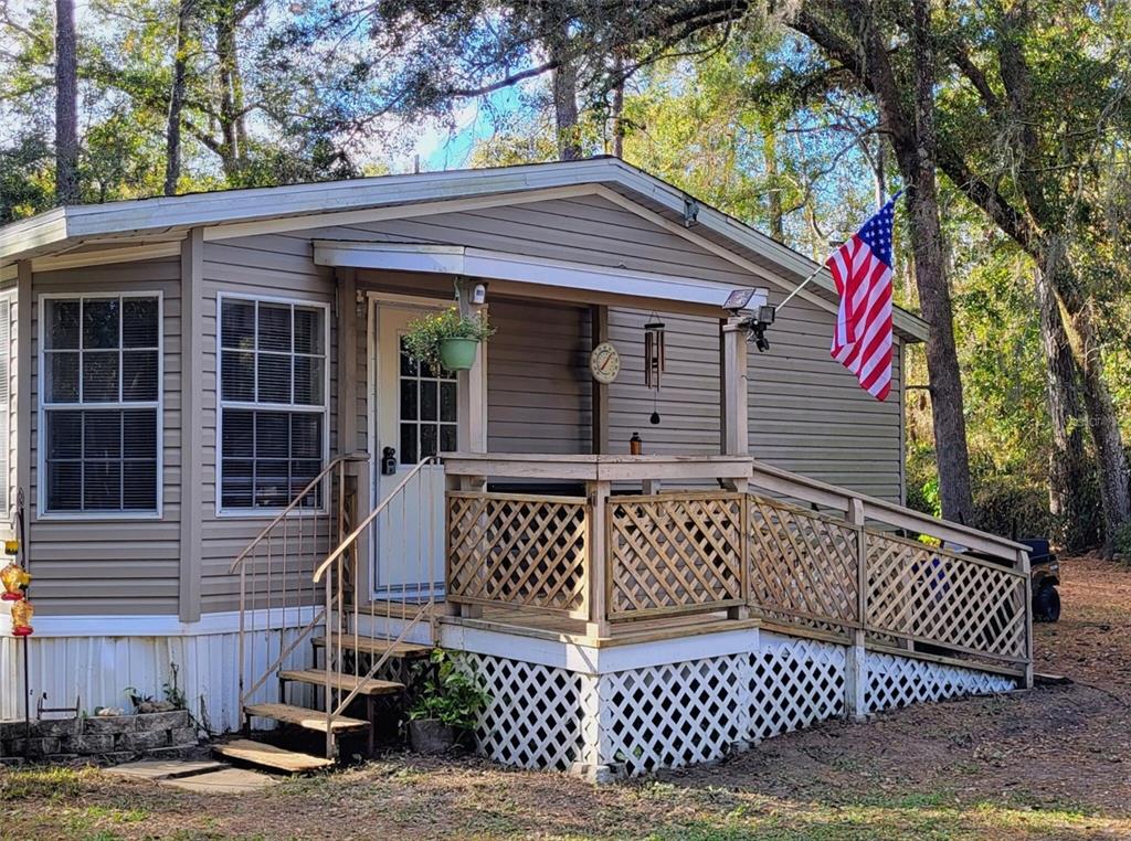 2498 Saturn Road Brooksville, FL 34604 - Photo 19 of 26 a view of a house with a door