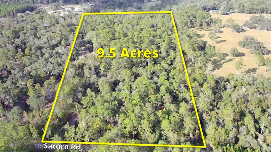 2498 Saturn Road Brooksville, FL 34604 - Photo 2 of 26 a sign that is on the side of a building