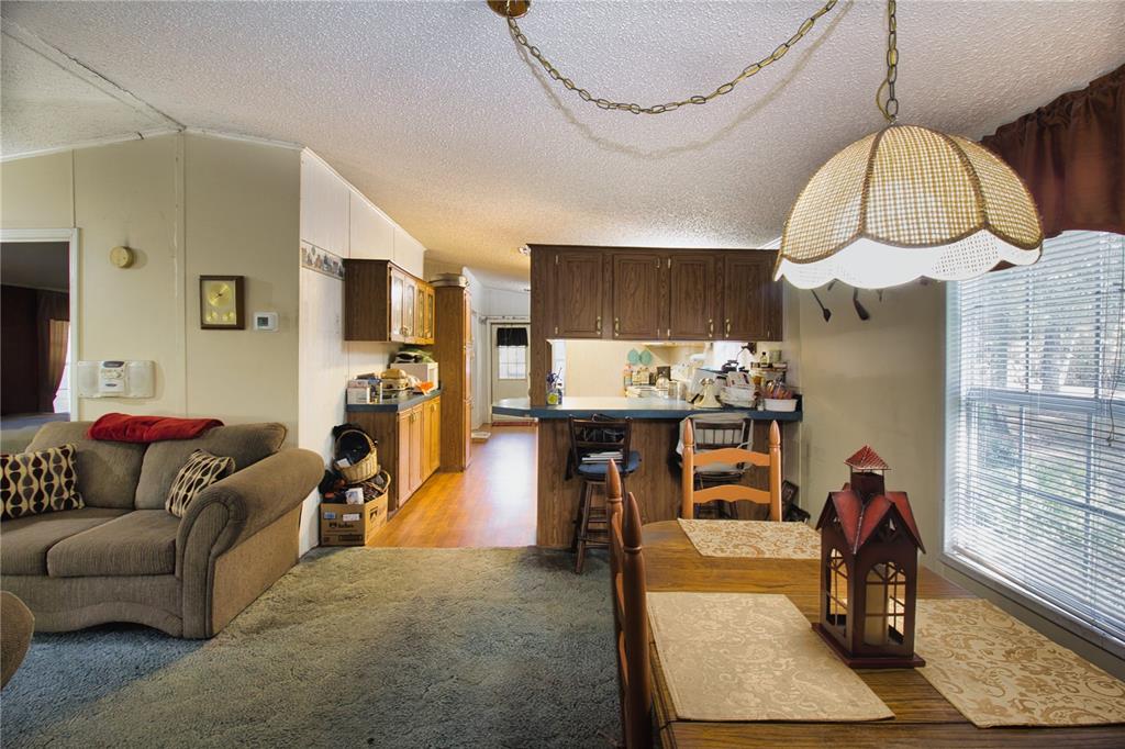 2498 Saturn Road Brooksville, FL 34604 - Photo 6 of 26 a view of living room and dining room
