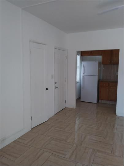 8910 Collins Avenue, Unit 1 Surfside, FL 33154 - Photo 13 of 16 a view of an empty room