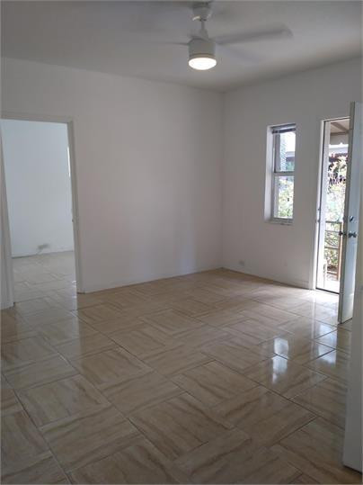 8910 Collins Avenue, Unit 1 Surfside, FL 33154 - Photo 14 of 16 an empty room with windows