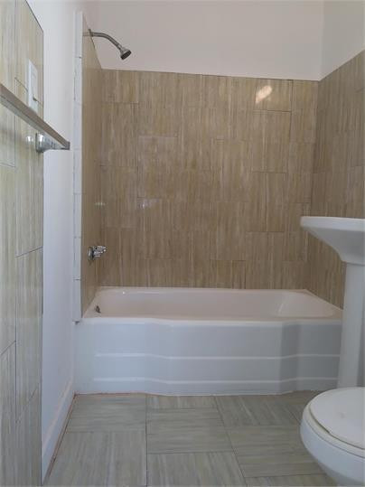8910 Collins Avenue, Unit 1 Surfside, FL 33154 - Photo 6 of 16 a bathroom with a bathtub and a shower