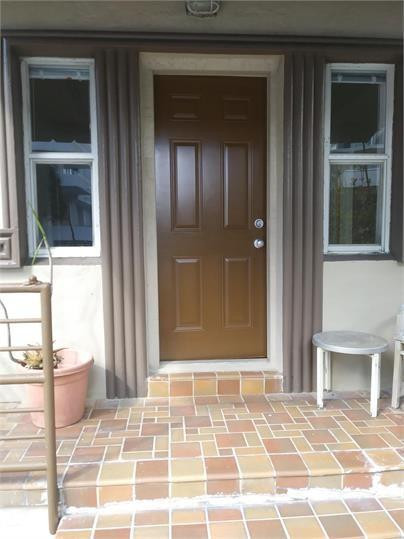 8910 Collins Avenue, Unit 1 Surfside, FL 33154 - Photo 9 of 16 a view of a entryway door of the house