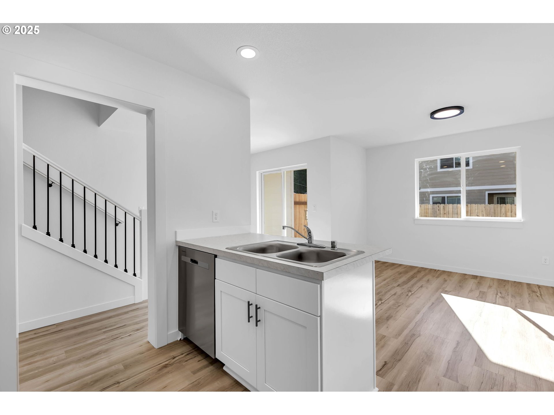 805 West Front Street Winlock, WA 98596 - Photo 12 of 31 a kitchen with a stove and a wooden floor