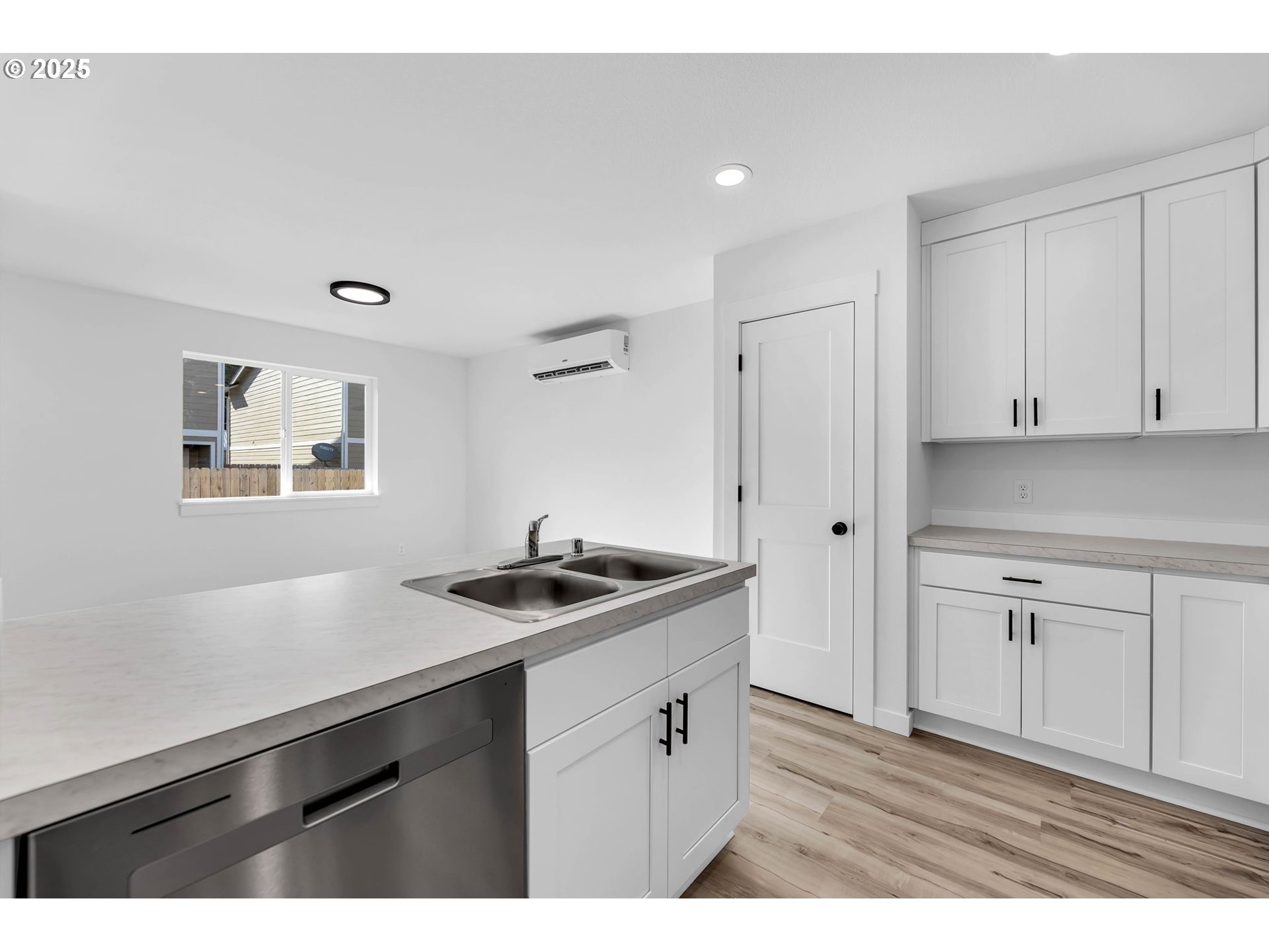 805 West Front Street Winlock, WA 98596 - Photo 13 of 31 a kitchen with stainless steel appliances granite countertop a sink stove and cabinets