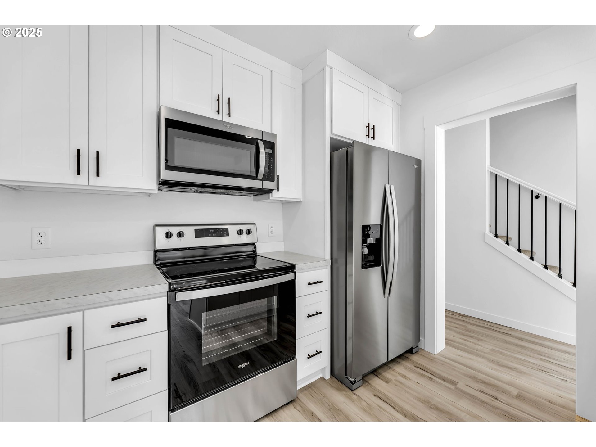 805 West Front Street Winlock, WA 98596 - Photo 15 of 31 a kitchen with stainless steel appliances a refrigerator stove and microwave