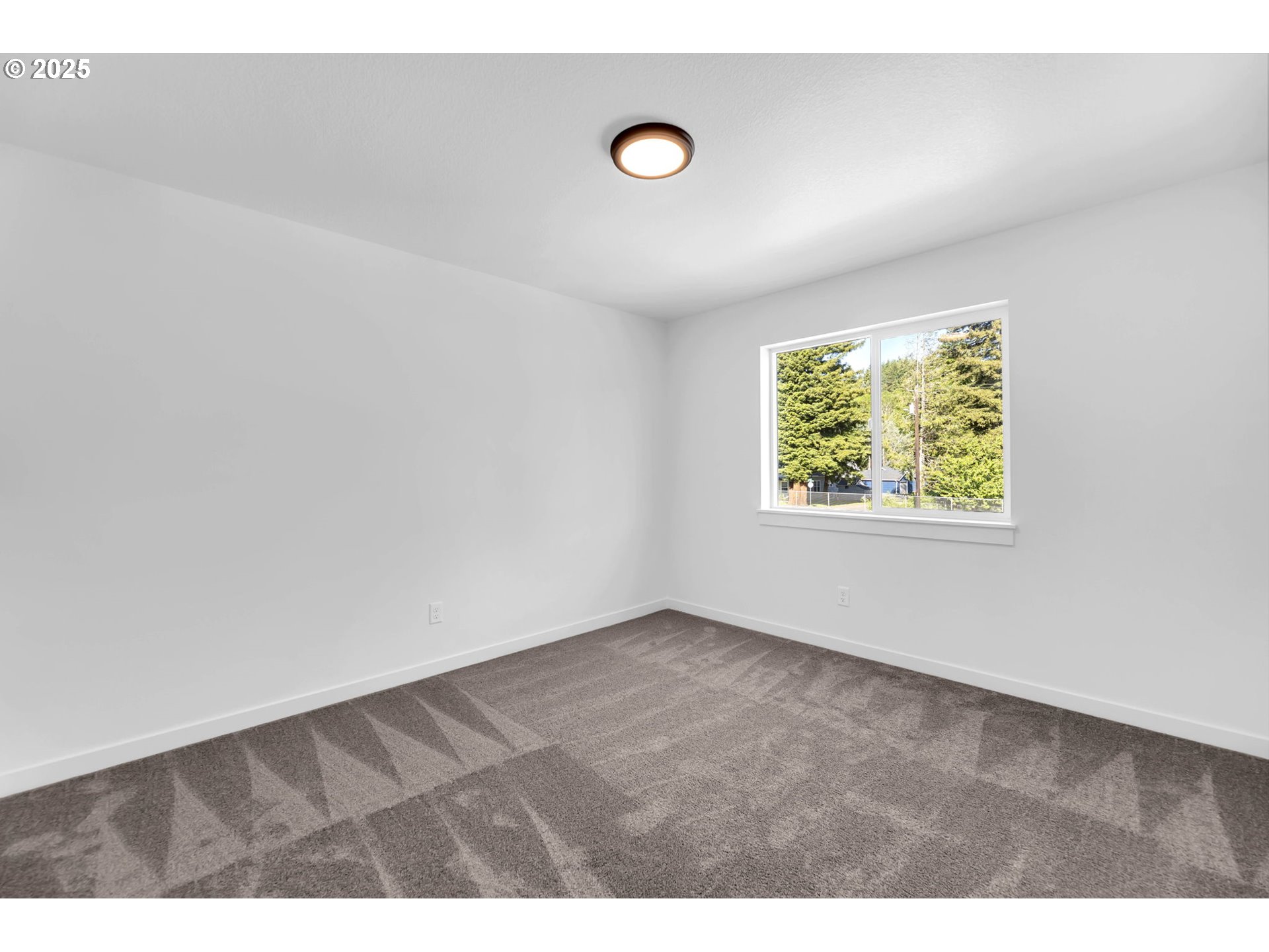 805 West Front Street Winlock, WA 98596 - Photo 19 of 31 an empty room with windows and closet