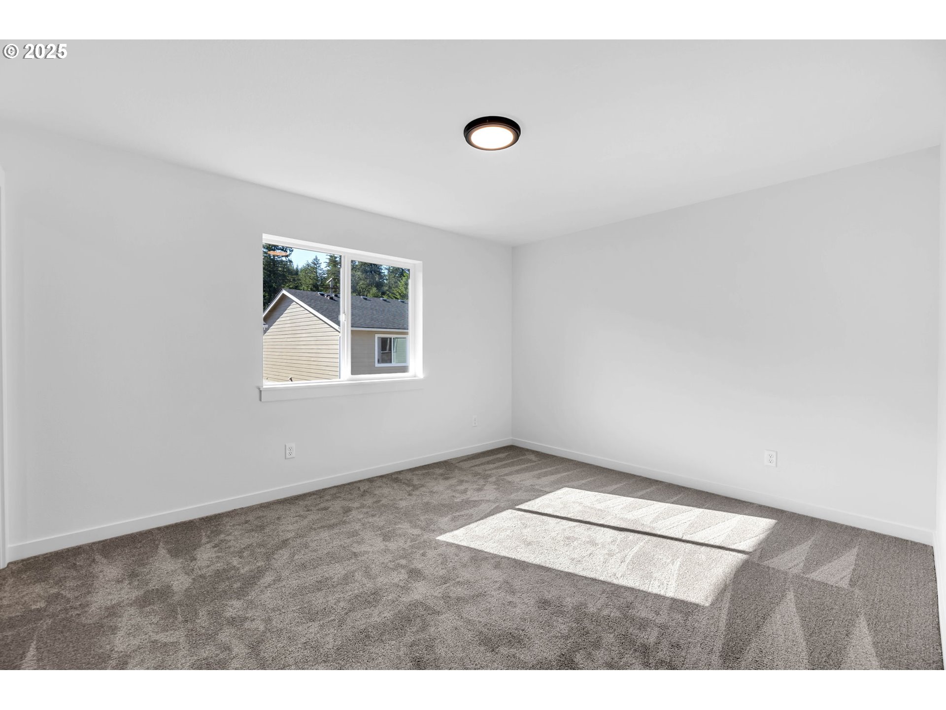 805 West Front Street Winlock, WA 98596 - Photo 24 of 31 a view of an empty room with a window