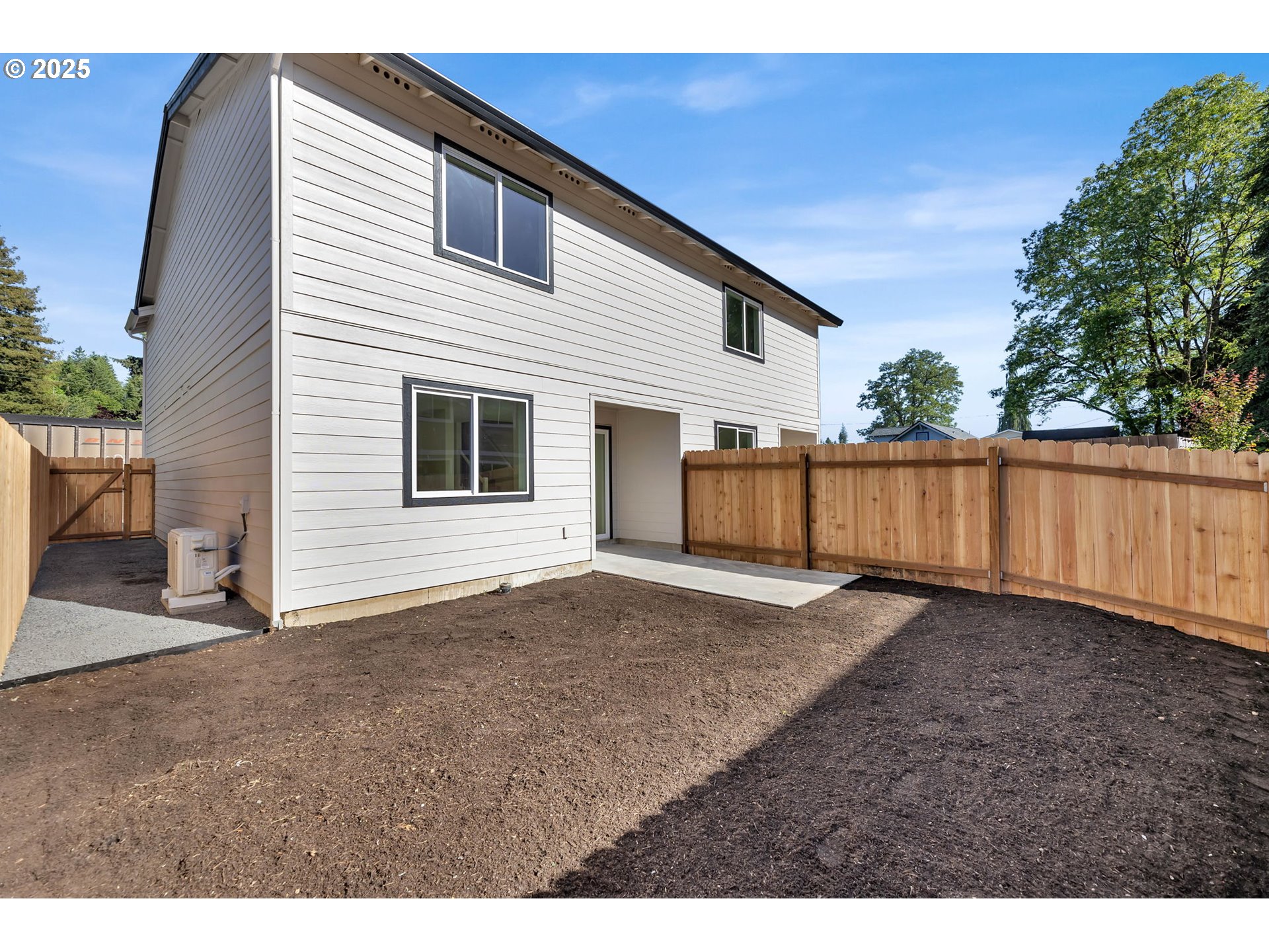 805 West Front Street Winlock, WA 98596 - Photo 30 of 31 a view of a backyard with wooden fence
