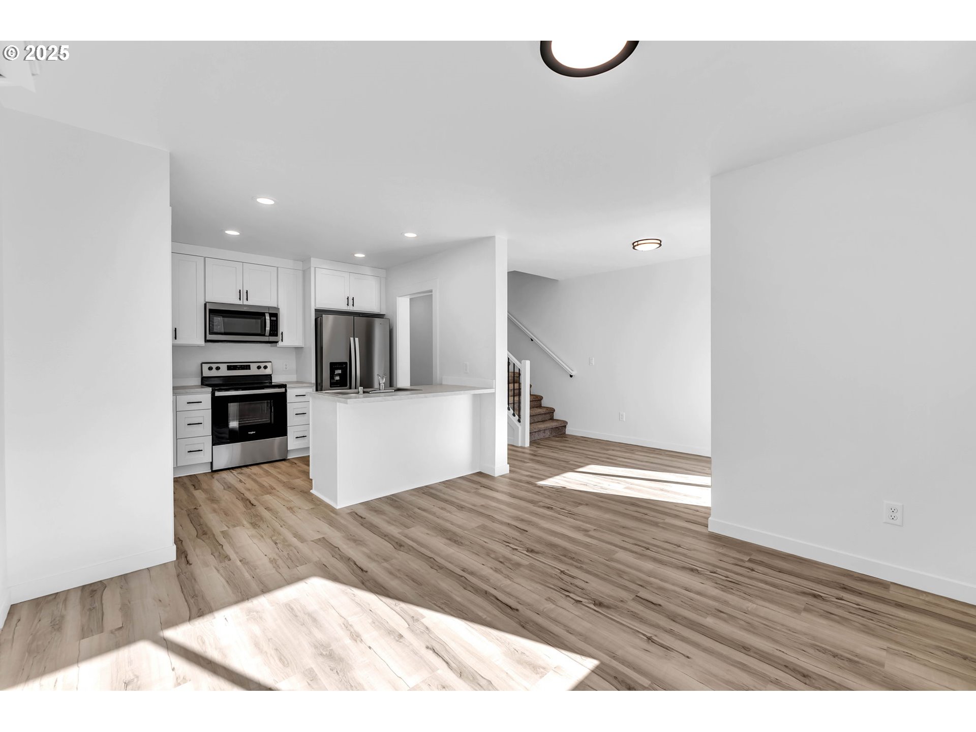 805 West Front Street Winlock, WA 98596 - Photo 9 of 31 a view of kitchen with wooden floor