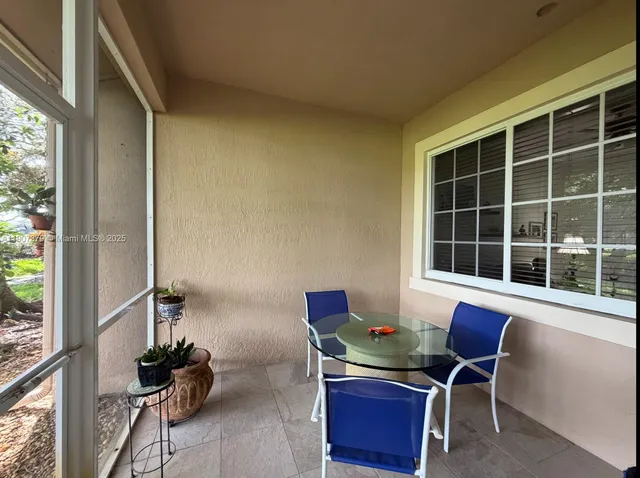 a workspace with furniture and a window